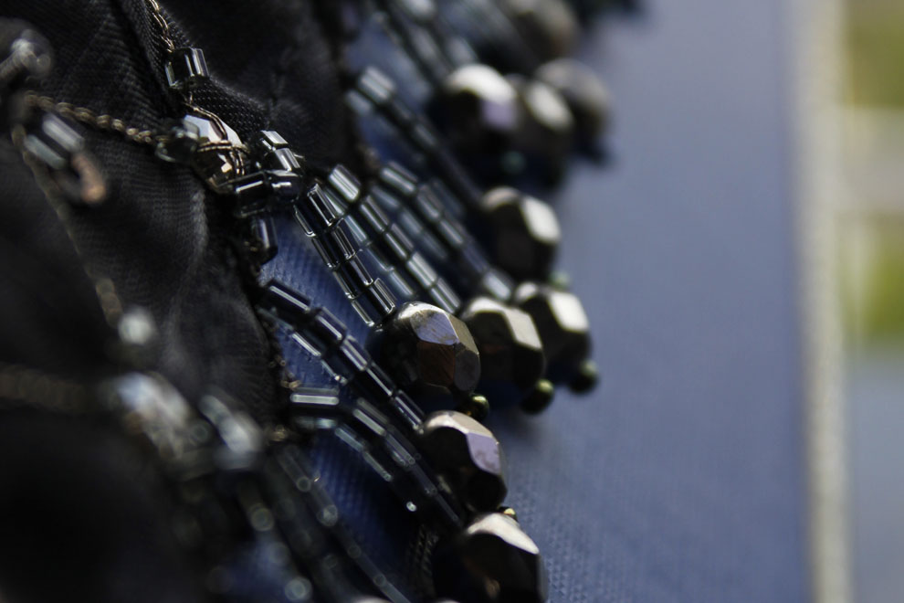 Intricate multi-colour hand beaded motif — real Imroz Fashions embroidery work