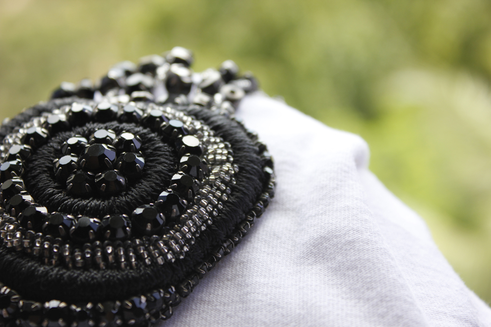 Hand beaded spiral motif in black and silver crystals — evening wear embroidery by Imroz Fashions
